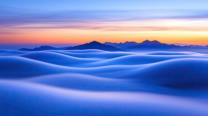 Poster - Sunset landscape abstract background idea. Breathtaking view of rolling blue hills under a colorful sunset sky.