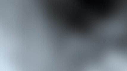 Poster - A blurred image with soft gradients of black and gray, creating a serene and abstract visual effect.