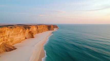 Poster - Seaside cliffs landscapes idea. Stunning coastal view with cliffs and tranquil blue ocean at sunset.