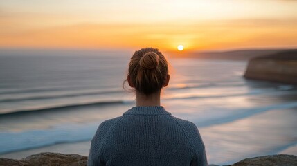 Poster - Sunset over ocean landscapes idea. A person enjoying a serene sunset by the ocean, reflecting on life's moments.