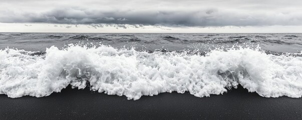 Aufkleber - Beach waves landscapes idea. A dramatic view of ocean waves crashing against a dark sandy shore under cloudy skies.