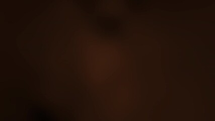 Aufkleber - A blurred, abstract image with warm tones, focusing on soft shapes and contrasts that evoke a sense of mood and depth.