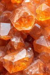 Poster - Captivating close up of vibrant orange calcite crystals showcasing natural geometric formations and warm light creating a textured geological background
