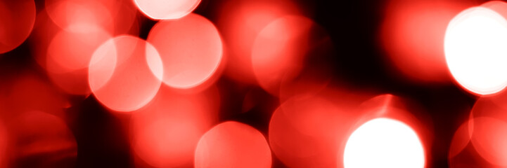 Wall Mural - Blurred lights red background, banner texture. Abstract bokeh with soft light header. Wide screen wallpaper. Panoramic web banner with copy space for design