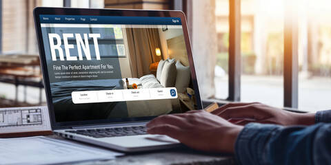 Online real estate rental search brisk on computer. House home or apartment rental website online.
