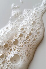 Poster - Abstract Soap Bubble Foam Texture on White Surface Close Up Gentle Cleansing Concept for Beauty and Hygiene Products Minimalist Aesthetic Background