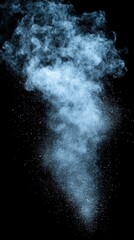 Poster - Ethereal cloud of blue powder explosion against black background creating a dramatic and abstract visual effect with a mysterious and captivating mood
