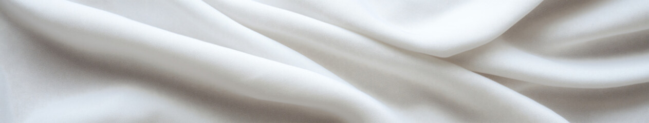 Poster - Delicate Fabric: soft, flowing folds of delicate white fabric create a mesmerizing display, the subtle textures and curves dancing in the light.