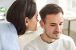 © Studio Romantic - Secret sharing, chatty woman, talkative wife telling news to man, husband, whispering at ear, family communication chatting, having fun, sharing hearing, rumor, good trust family relationship, message