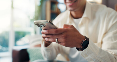 Poster - Smartphone, hands and man on sofa in home for social networking on mobile app for connection. Phone, communication and closeup of male person texting for online dating in living room at apartment.