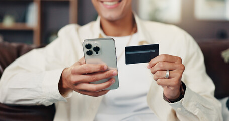 Aufkleber - Credit card, phone and hands of man for online shopping, internet banking and payment in home. Ecommerce, fintech and person on smartphone for website sale, purchase and discount in living room