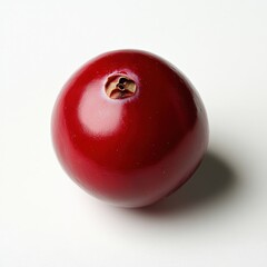 Poster - Fresh cranberry displaying a vibrant red hue on a neutral background, emphasizing its glossy surface and natural beauty