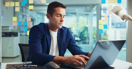 Fototapete - Business, thinking and man with laptop, typing and planning for project, decision and connection. Person, employee and consultant with sales agency, choice and computer for website info and network