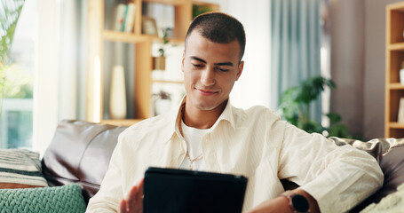 Poster - Home, sofa and man with smile for tablet, online news and reading information for blog in living room. House, male person and scroll with digital for social media, application and ebook on couch