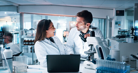 Leinwandbilder - Laptop, microscope and science with people in laboratory together for development. Computer, conversation and collaboration with medical team in clinical trial for reaction to surprise breakthrough