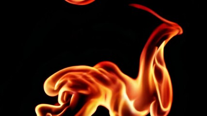 Poster - Dynamic swirling flames against black background. Energy and fire concept