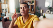 © peopleimages.com - Happy man, portrait and idea with selfie for video recording, online tutorial or content creation at home. Male person, influencer or smile with pov for social media, post or communication at house