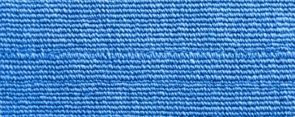 Poster - A close-up of textured blue fabric showcasing striations and intricate stitching patterns, ideal for design or textile references, Denim Texture woven  seamless.