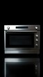 © Ева Поликарпова - A stainless steel oven sitting on a black surface, ready for use