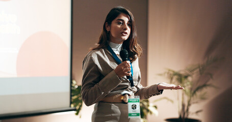 Aufkleber - Business woman, seminar and speech for speaker in conference room for wellness training. Education, forum presentation and microphone with corporate coach on stage for public relations or development