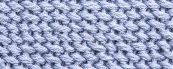 Poster - A close-up of a textured, knitted fabric showcasing a pattern of interwoven threads in shades of blue and gray, Denim Texture woven  seamless.