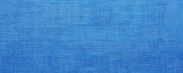 Poster - A close-up view of a textured blue fabric, showcasing intricate patterns and a soft, woven appearance perfect for various design applications, Denim Texture woven seamless.