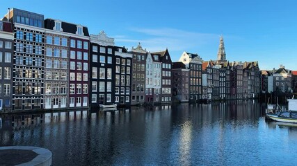 Wall Mural - facades of old historic houses over canal water, amsterdam, netherlands