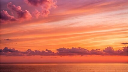 Poster - A vibrant sunset reflecting on the calm ocean water, with colorful clouds scattered across the sky.