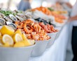 © Dani - Seafood buffet display with shrimp and oysters