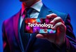 © Sanook - A sharp suit, a sleek phone displaying 'Technology', grey, communication