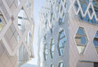 © ADDICTIVE STOCK - Modern auditorium facade design with reflective glass windows