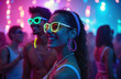 © Pete - Students enjoy neon glow party with vibrant atmosphere, colorful lights. Young people celebrate nightlife dancing, smile, laugh, wear glowing accessories. University students fun, express joy at