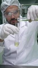 Poster - Two scientist in professional uniform working in curative laboratory for chemical and biomedical experiment