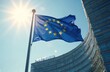 © Pete - EU flag waving wind against modern parliament building on sunny day. European Union emblem flutters freedom, unity. Symbol of international collaboration, economic partnership against blue sky