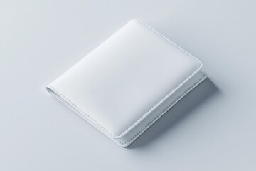 Poster - Minimalist white mockup showcasing a sleek wallet design on a smooth light surface