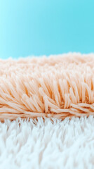 Poster - Plush carpet featuring peach and white tones spreading across soft surface, complemented by tranquil light blue background