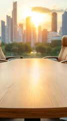Poster - Wooden meeting table with executive chairs in a modern office overlooking a city skyline at sunset