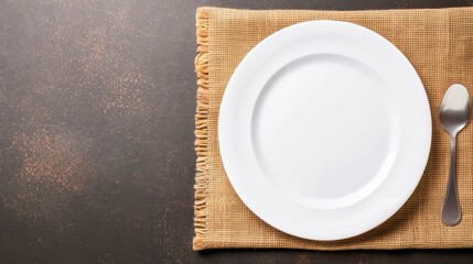 Fototapete - A simple, elegant empty plate rests on a beige linen napkin against a rustic brown background, perfect for presentations.