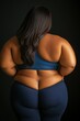 © Ben - Curvy confident woman in athletic wear seen from behind, embracing body positivity, fitness strength, and self-empowerment in a powerful and dynamic image, Generative AI