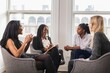 © Rawpixel.com - A diverse group of business women in a meeting. Business women discussing ideas, women collaborating, The group of professional business women includes different ethnicity in meeting, business meeting