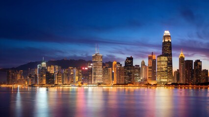 Wall Mural - Stunning city skyline illuminated at night, reflecting on the calm waters