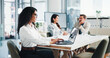© peopleimages.com - Meeting, businesswoman and typing with laptop in office, about us and research for stock market. Boardroom, female person and trader with tech for financial performance, risk management and corporate