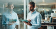 © peopleimages.com - Tablet, thinking and smile with business man in office for planning, company consultant and window. Professional, client feedback and research with person in agency for reflection, vision and idea
