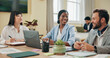 © peopleimages.com - Feedback, laptop and business people in meeting, teamwork and cooperation for project. Happy employees, copywriting and group in office, ideas and planning for proposal, sales growth and website info