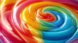 © Nipawan - Vibrant rainbow swirl lollipop with glossy texture