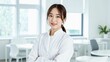 © Yuudaishin - Asian Female Healthcare Professional in a Private Medical Clinic: Skilled Doctor Providing Quality Medical Care in a Clean and Modern Facility