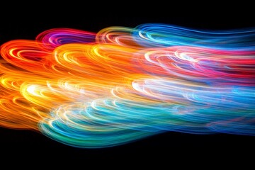 Aufkleber - Colorful light trails create dynamic patterns against a dark background during an art event in the evening
