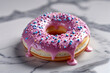 © m.naeem - pink frosted donut with sprinkles and dripping glaze, showcasing the indulgent sweetness and playful texture of a classic pastry treat on a marble surface