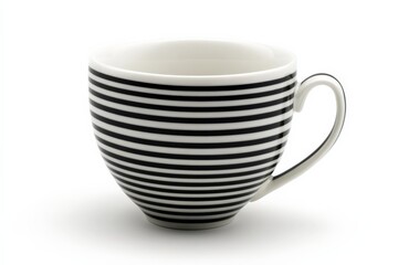Poster - Striped ceramic cup with black and white patterns on a smooth surface under soft lighting