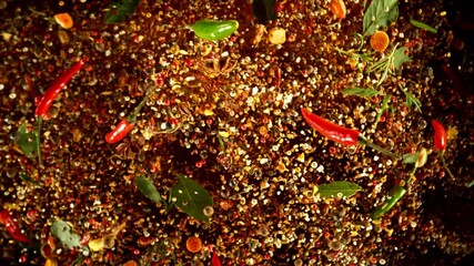 Poster - Super slow motion of rotating spices mix on black background. Ultimate realistic twister motion, studio shot. Filmed on high speed cinema camera, 1000 fps